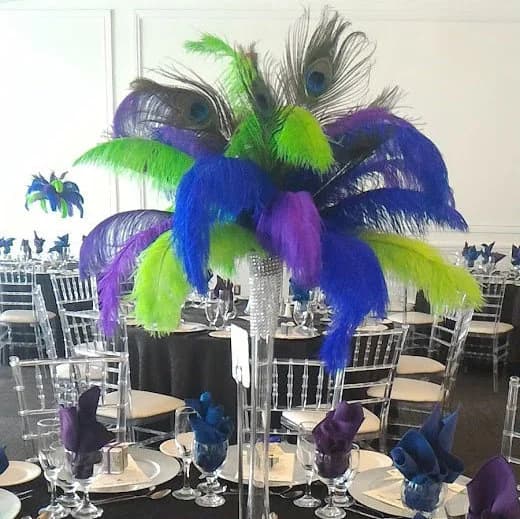 Peacock and Ostrich Feather Centerpiece for Peacock themed parties!
