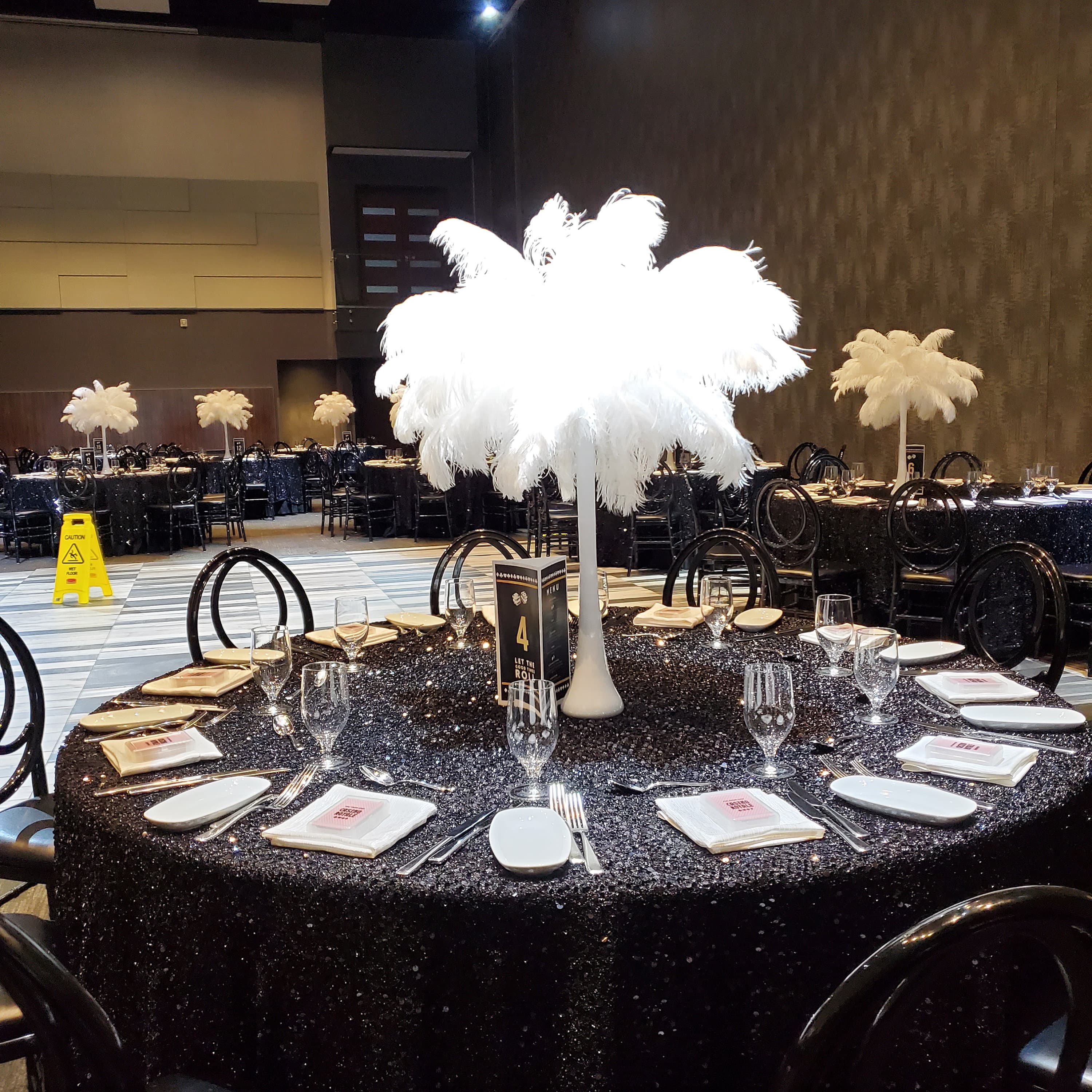 Ostrich Feather Centerpiece with White Eiffel Tower Vase